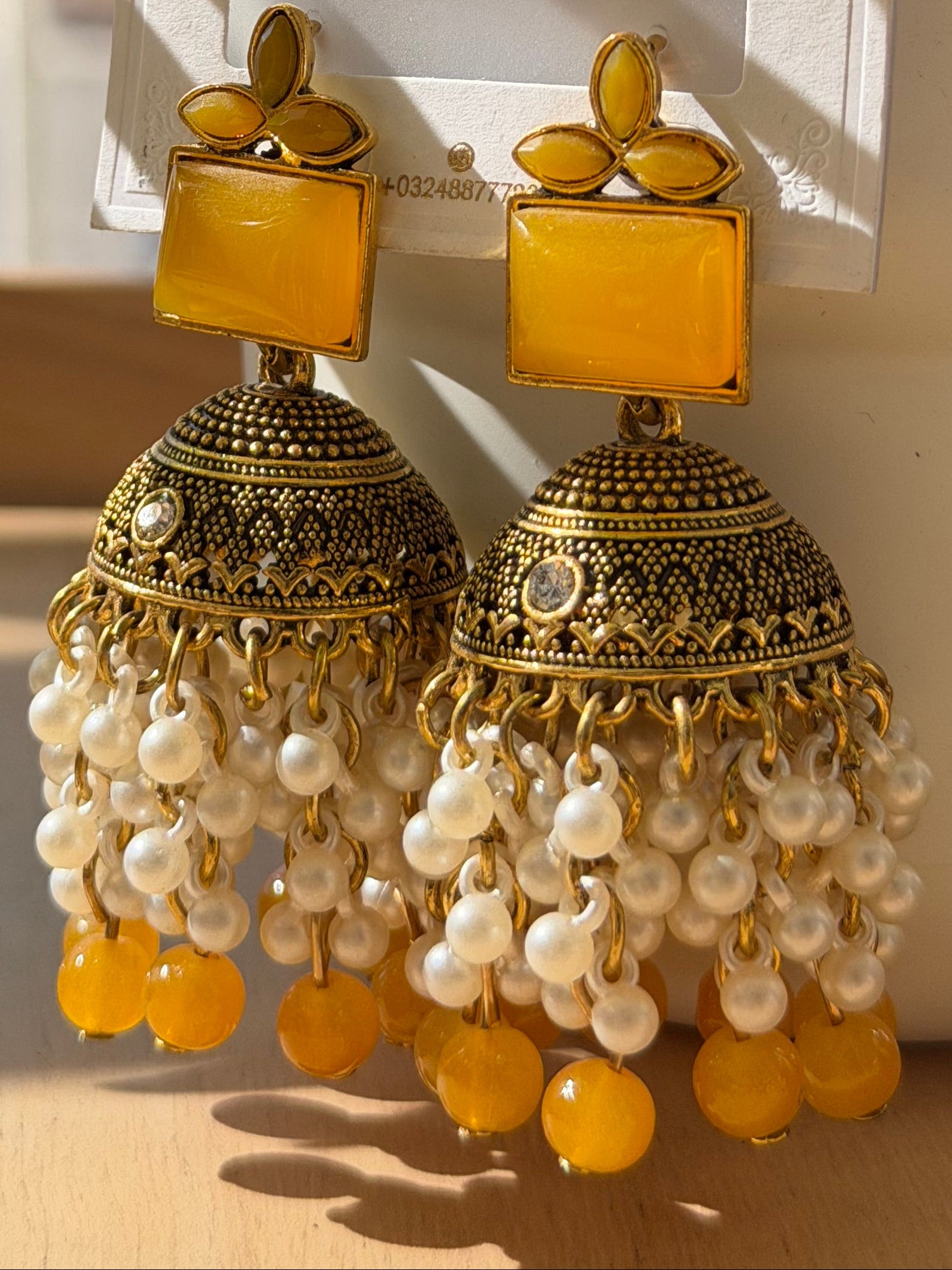 Yellow pearl jhumkas