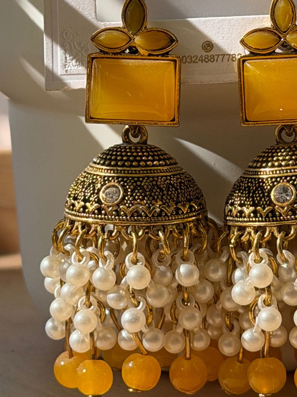 Yellow pearl jhumkas